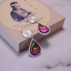 Boucle d'oreiller larme broderie